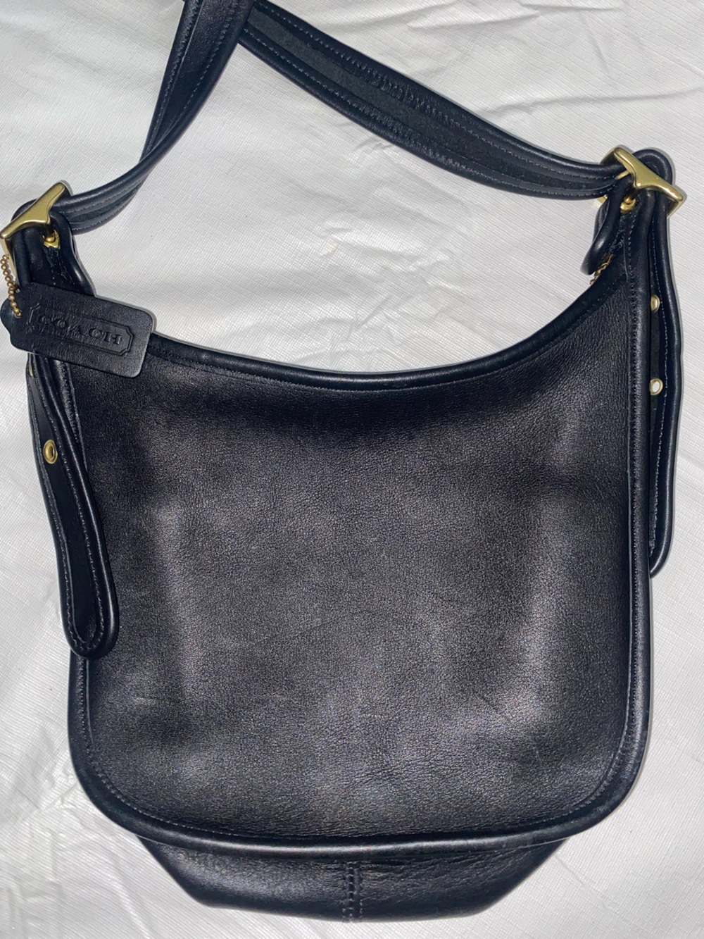 Coach Black Leather Messenger Bag with Brass Accents